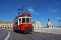 Red tram on a square Praca de Comercio in Lisbon, Portugal Royalty Free Stock Photo